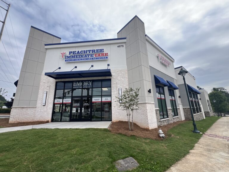 The exterior of Peachtree Immediate Care Buckhead North at the corner of Roswell Road and Windsor Parkway.